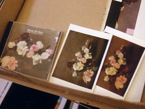 CD of New Order, Power Corruption and Lies plus poastcards of Roses by Henri Fantin Latour, from the National Gallery