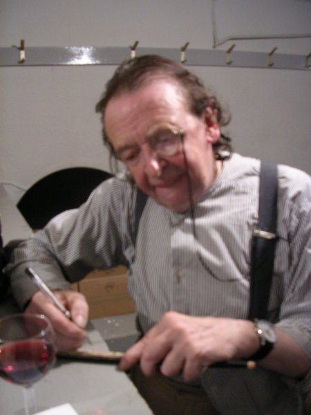 The Durutti Column - Ronnie Scott's, London, 26 September 2004; Bruce Mitchell signs a black lacquered drumstick for Andrea Bianco