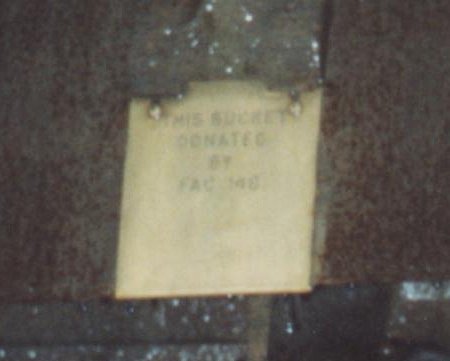 FAC 148 Quarry Bank Mill water wheel bucket; the FAC 148 brass plaque