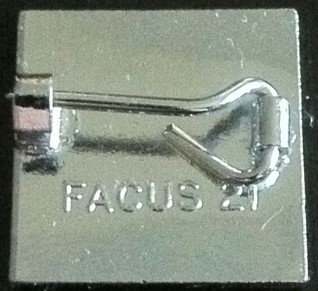 FACUS 21 Factory US logo badge [red, reverse]