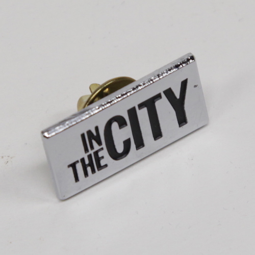 In The City Badge (blue/yellow)
