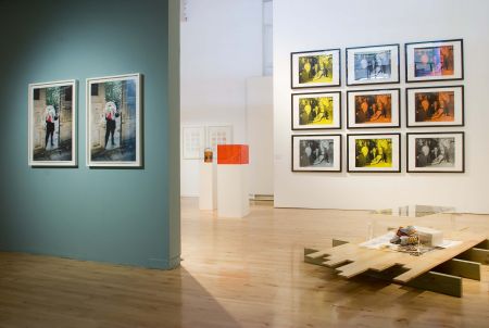 International Orange Stanley Picker Gallery installation view left foreground: Ben Kelly and Peter Saville - Anthony H Wilson arriving at Factory HQ - digital print edition, 2008 photo: www.ellielaycock.com