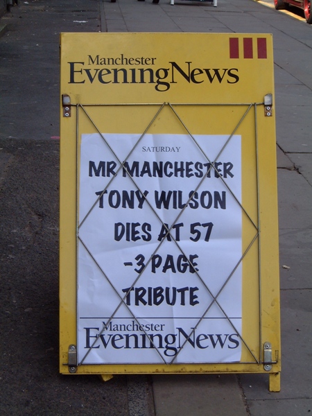 Manchester Evening News street hoarding announcing the death of Tony Wilson